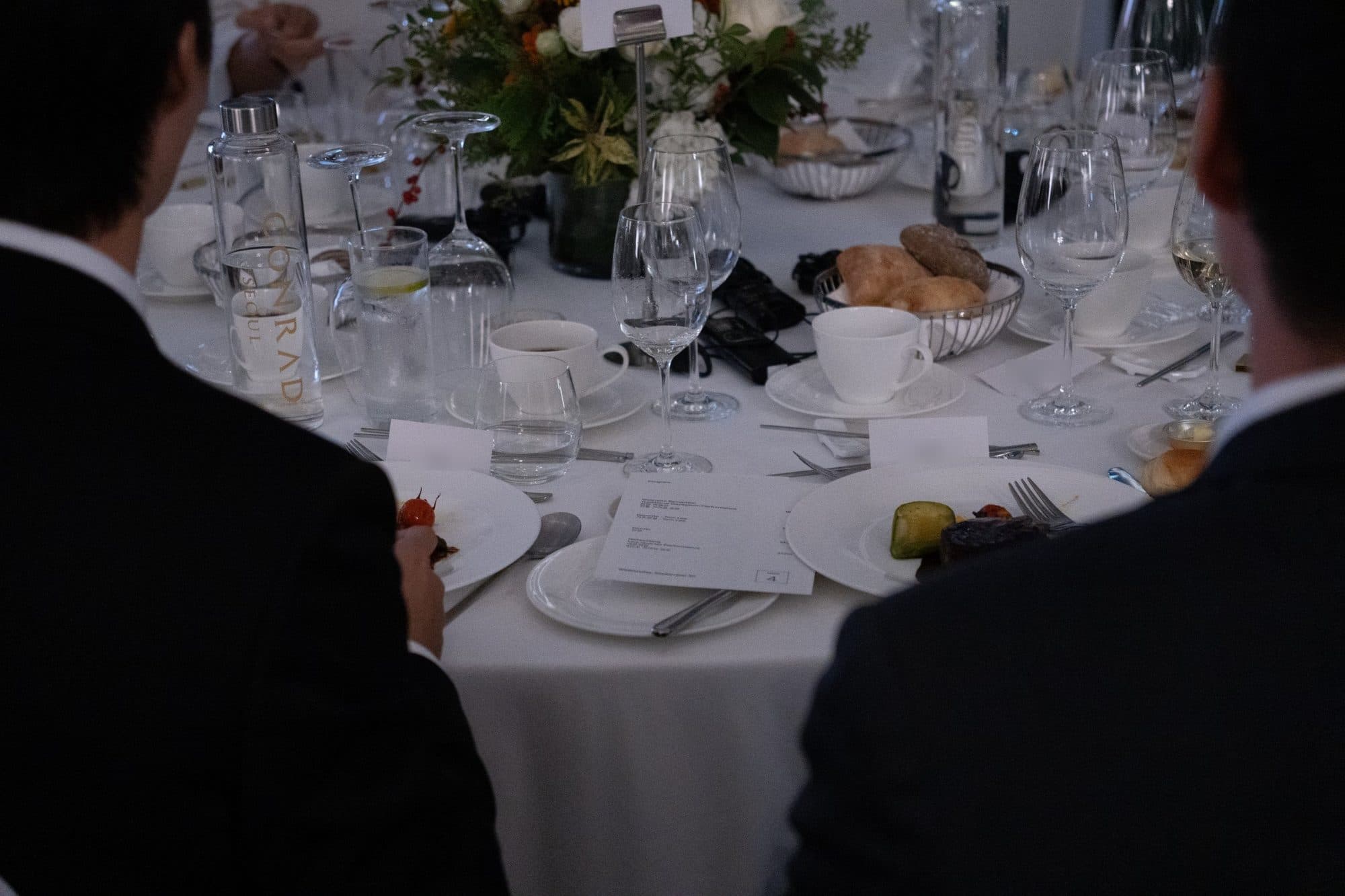 Guests seated at a private dinner produced by ORA